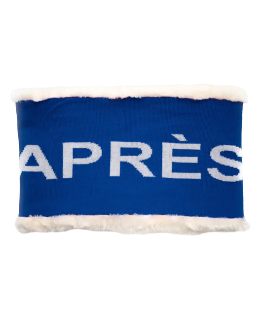 A blue and white merino wool snood with the word 'APRÈS' knitted on the front, with a plush interior visible at the bottom.